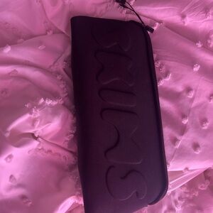 SKIMS Black Cosmetic Bag Sleek Design